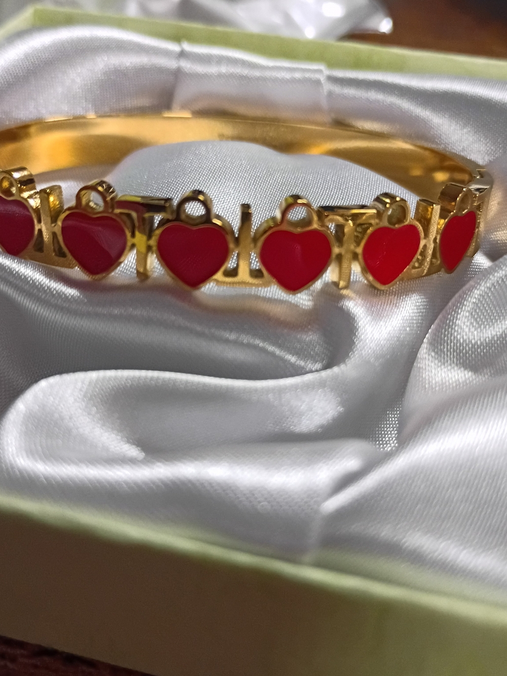 Others Follow Gold Tone Bracelet with Red Heart Charms
